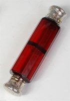 Lot 1052 - A late Victorian faceted cranberry glass...