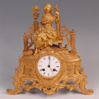 Lot 1252 - A late 19th century French gilt brass mantel...