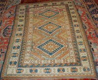 Lot 1268 - A Turkish woollen rug, having a triple diamond...