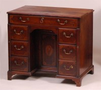 Lot 1290 - *An antique mahogany and inlaid kneehole desk,...