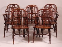 Lot 1292 - A harlequin set of eight elm and yew Windsor...