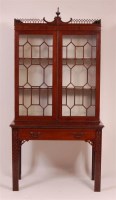 Lot 1302 - A circa 1900 mahogany bookcase after Thomas...