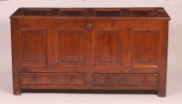 Lot 1303 - An 18th century joined oak four panel mule...