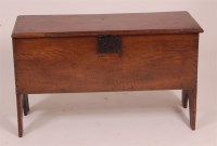 Lot 1314 - An 18th century planked oak coffer, on...