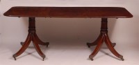 Lot 1317 - A mahogany twin pedestal dining table, in the...