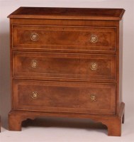 Lot 1328 - A figured walnut and crossbanded chest, in the...