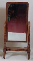 Lot 1350 - An early Victorian mahogany cheval mirror, the...