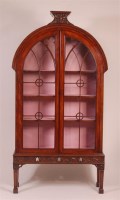 Lot 1362 - A Regency mahogany bookcase on associated...