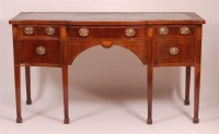 Lot 1285 - *A George III mahogany shaped front sideboard,...