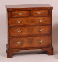 Lot 1294 - An early 18th century style walnut bachelors...