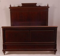 Lot 1338 - A French Empire plum pudding mahogany and...