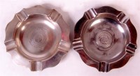Lot 5 - A pair of ashtrays, one steel, one EPNS, both...