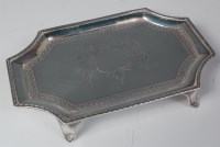 Lot 470 - A George III silver teapot stand, having...