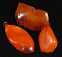 Lot 529 - A butterscotch amber pendant, of ovoid form, 9....