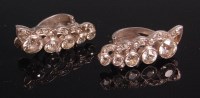 Lot 537 - A pair of white metal and diamond set ear...