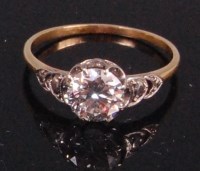Lot 554 - A ladies yellow gold diamond solitaire ring,...