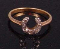 Lot 555 - A ladies yellow gold diamond set dress ring,...