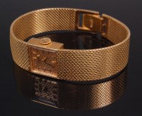 Lot 564 - A ladies Juvenia 18ct gold bracelet watch,...