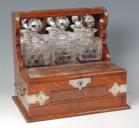 Lot 598 - A circa 1900 oak and silver plate mounted...