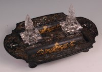 Lot 603 - A late Victorian papier-mache deskstand,...