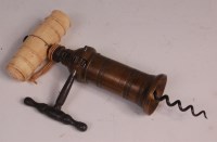 Lot 613 - A Victorian Kings corkscrew, having brass...