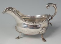 Lot 466 - An early George III silver sauceboat, having a...