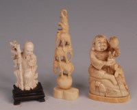 Lot 657 - A Japanese Meiji period carved ivory okimono,...