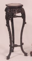 Lot 639 - An early 20th century Chinese carved hardwood...