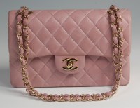 Lot 70 - Coco Chanel (1883-1971) - A dusky pink leather...