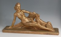 Lot 4 - A large Art Deco gilded plaster figure of a...