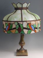 Lot 84 - A Tiffany style table lamp, having a large...