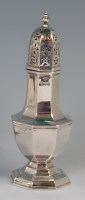 Lot 558 - A George V silver lighthouse sugar castor, of...