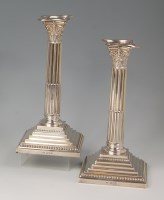 Lot 567 - A pair of Edwardian silver Corinthian column...
