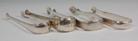 Lot 575 - Four pairs of early 19th century silver sugar...