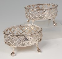 Lot 582 - A pair of George III silver table salts, each...
