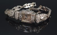 Lot 673 - A ladies Art Deco platinum and diamond set...