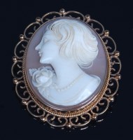 Lot 700 - A Victorian style carved shell cameo brooch,...