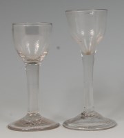 Lot 503 - An 18th century wine glass, with ogee bowl,...