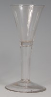 Lot 505 - An 18th century wine glass, with funnel bowl,...
