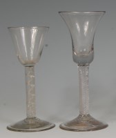 Lot 512 - An 18th century wine glass, with bell-shaped...