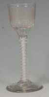 Lot 526 - A mid-18th century wine glass, the ogee bowl...