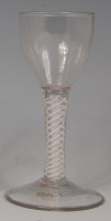 Lot 529 - A mid-18th century wine glass, with pointed...
