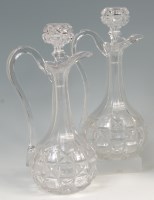 Lot 542 - A pair of Victorian cut glass ewers and...