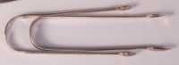 Lot 592 - A pair of George IV silver sugar bows,...