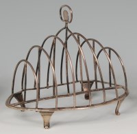 Lot 593 - A George III silver six division toast-rack,...