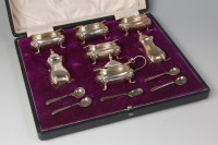 Lot 597 - A Walker & Hall cased silver seven piece cruet...