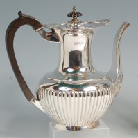 Lot 612 - A Walker & Hall silver coffee pot, having a...