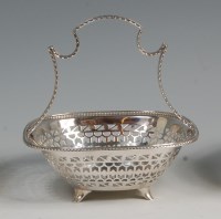 Lot 626 - A George V silver sweetmeat basket by Asprey &...