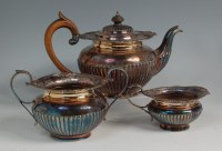 Lot 637 - A circa 1900 silver three piece teaset,...