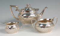 Lot 639 - An Edwardian silver three piece tea set,...